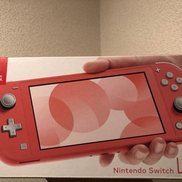 最高品質の Switch Nintendo - コーラル light 新品未使用　Switch 携帯用ゲーム機本体
