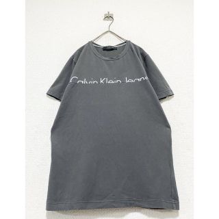 カルバンクライン(Calvin Klein)のvintage CK コンクリートグレー デザイン ロゴ プリント Tシャツ(Tシャツ(半袖/袖なし))