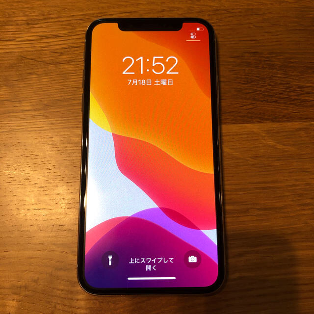 スマートフォン/携帯電話美品　iPhone X シルバー　docomo 64Ｇ ケース付き^ ^