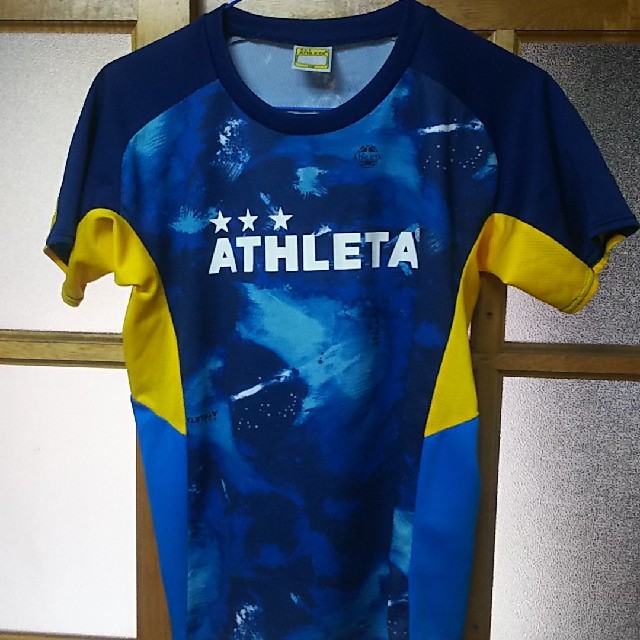 ATHLETA(アスレタ)のなおみさん専用(中古)アスレタ シャツ  150cm  サッカー  ピステ スポーツ/アウトドアのサッカー/フットサル(ウェア)の商品写真