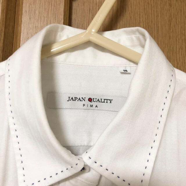 THE SUIT COMPANY(スーツカンパニー)のTHE SUIT COMPANY 紺色ステッチ白シャツブラウス レディースのトップス(シャツ/ブラウス(長袖/七分))の商品写真