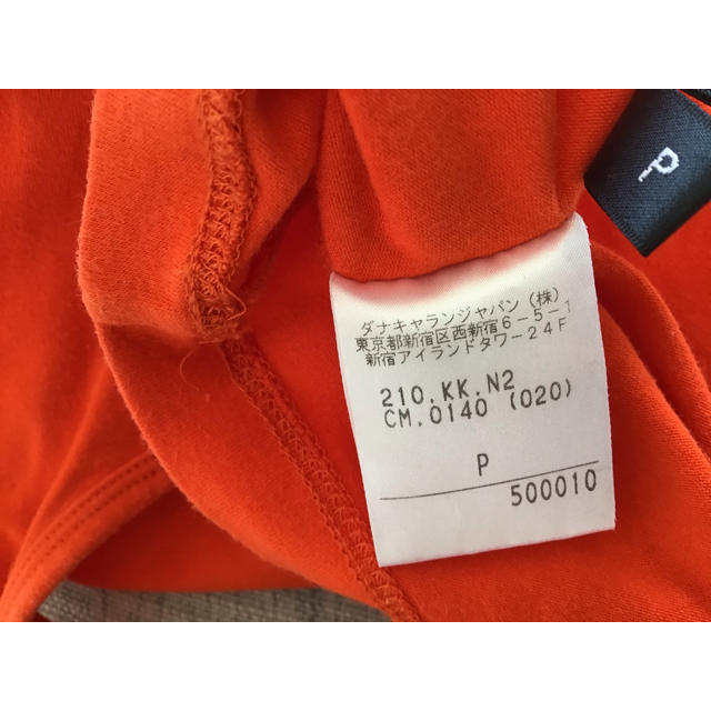 DKNY(ダナキャランニューヨーク)のダナキャランニューヨーク　DKNY タンクトップ　オレンジ　S  P レディースのトップス(タンクトップ)の商品写真
