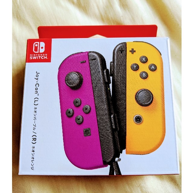 Nintendo Switch(ニンテンドースイッチ)のSwitch Joy-Conネオンパープル/ネオンオレンジ　任天堂スイッチ エンタメ/ホビーのゲームソフト/ゲーム機本体(家庭用ゲーム機本体)の商品写真