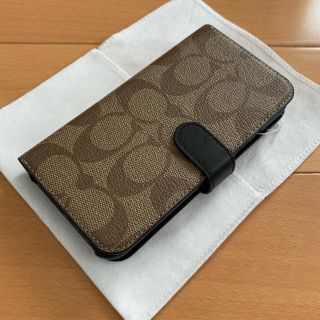 コーチ(COACH)の新品未使用です。COACH iPhone X/XS 手帳型 ケース シグネチャ(iPhoneケース)