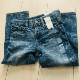 ベビーギャップ(babyGAP)の【新品未使用】恐竜柄デニム ジーンズ(パンツ/スパッツ)