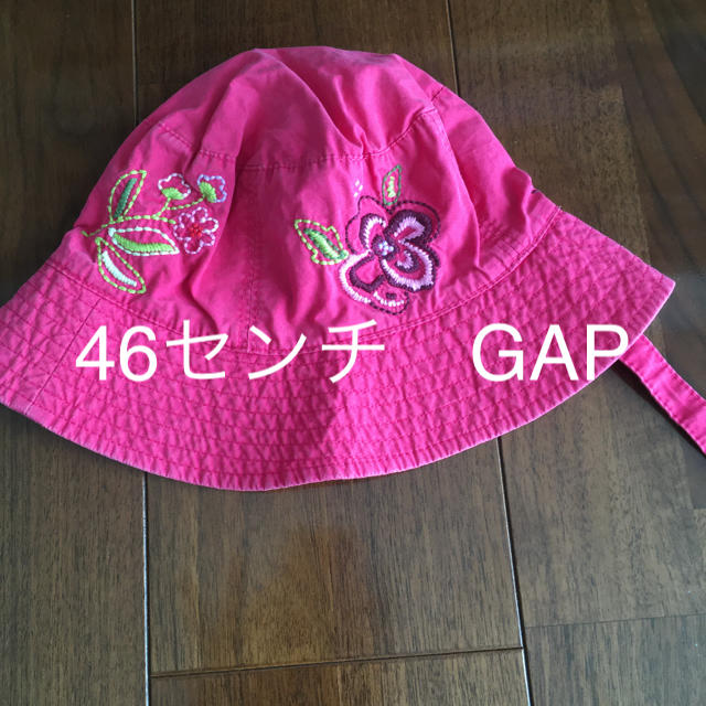 babyGAP(ベビーギャップ)のGAP 帽子　女の子　46センチ　中古　ピンク キッズ/ベビー/マタニティのこども用ファッション小物(帽子)の商品写真