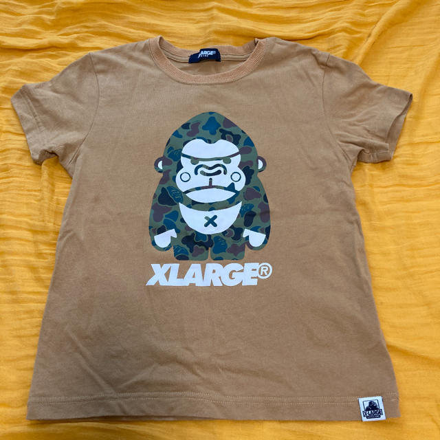 XLARGE(エクストララージ)の美品！XLARGE のロゴ付きちびゴリラTシャツ　140センチ キッズ/ベビー/マタニティのキッズ服男の子用(90cm~)(Tシャツ/カットソー)の商品写真