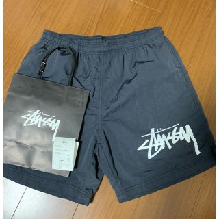 ステューシー(STUSSY)のNIKE×stussy WATER SHORT 黒　Mサイズ(ショートパンツ)