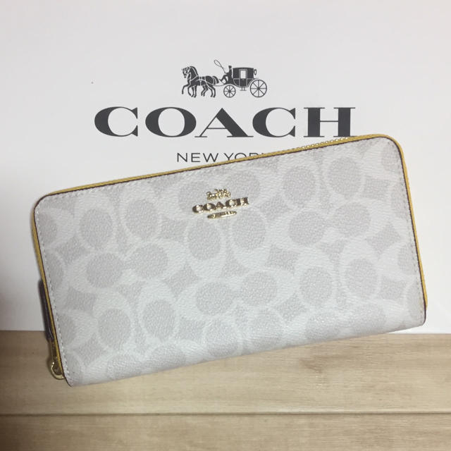 COACH(コーチ)の新作！新品 [COACH コーチ] 長財布 ホワイトシグネチャー  イエロー レディースのファッション小物(財布)の商品写真