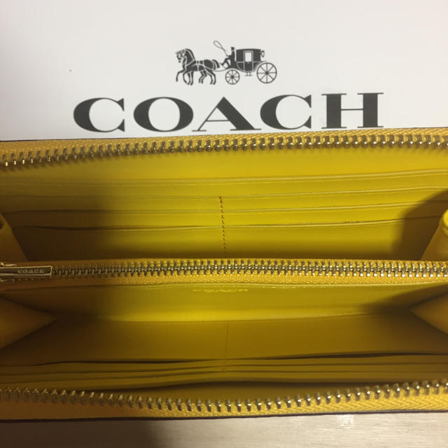 COACH(コーチ)の新作！新品 [COACH コーチ] 長財布 ホワイトシグネチャー  イエロー レディースのファッション小物(財布)の商品写真