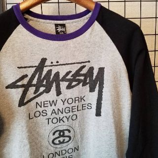 ステューシー(STUSSY)のSTUSSY WORLD TOUR ラグラン袖 七分丈 ベースボールシャツ(Tシャツ/カットソー(七分/長袖))