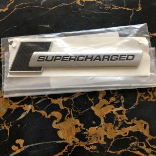 アウディ(AUDI)のAudi純正 SUPERCHARGED（リアルカーボン）エンブレム(車外アクセサリ)