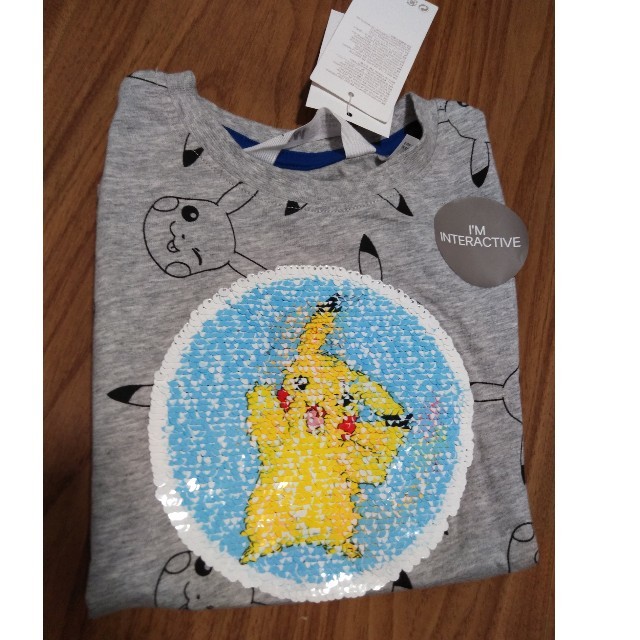 H&M(エイチアンドエム)の新品　H&M　ポケモンスパンコールTシャツ　105cm キッズ/ベビー/マタニティのキッズ服男の子用(90cm~)(Tシャツ/カットソー)の商品写真