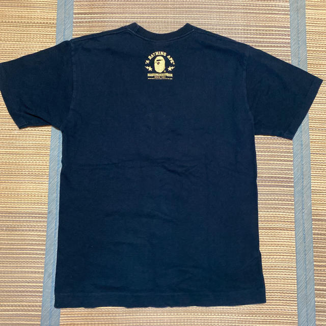 A BATHING APE(アベイシングエイプ)のAPE BAPE kaws tシャツ gold 金　generals m メンズのトップス(Tシャツ/カットソー(半袖/袖なし))の商品写真