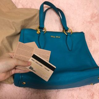 ミュウミュウ ターコイズの通販 72点 | miumiuを買うならラクマ