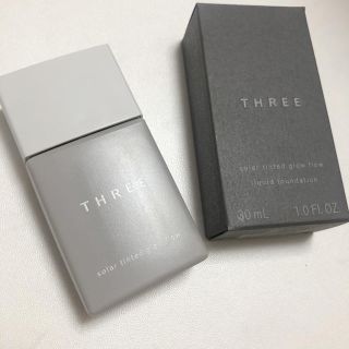 スリー(THREE)のTHREE ソーラーティンティドグローフロー 02(ファンデーション)