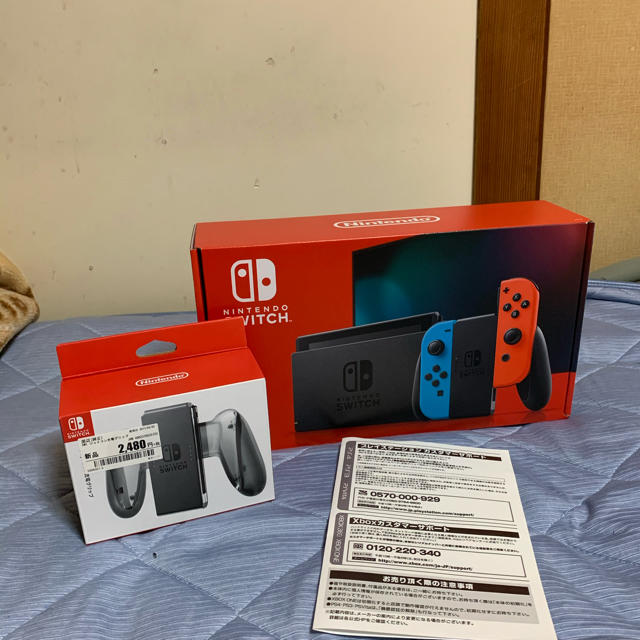 Nintendo Switch(ニンテンドースイッチ)の中古　新型　Nintendo Switch 本体 ネオンブルー ネオンレッド エンタメ/ホビーのゲームソフト/ゲーム機本体(家庭用ゲーム機本体)の商品写真