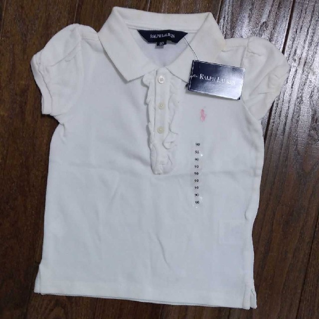 Ralph Lauren(ラルフローレン)のラルフローレン 白フリル ポロシャツ 90cm キッズ/ベビー/マタニティのキッズ服女の子用(90cm~)(Tシャツ/カットソー)の商品写真