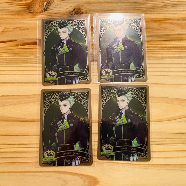 Disney(ディズニー)の【送料無料/新品】ツイステ メタルカード セベク 4枚 エンタメ/ホビーのアニメグッズ(カード)の商品写真