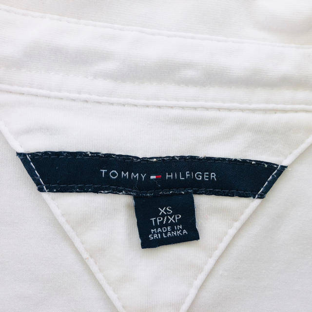 TOMMY HILFIGER(トミーヒルフィガー)の★訳ありトミーフィルフィガー白半袖 ポロシャツ レディースのトップス(ポロシャツ)の商品写真