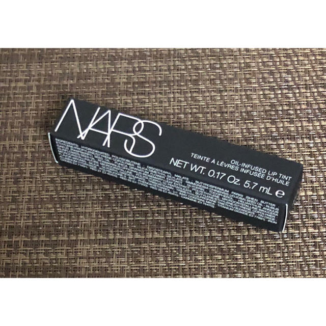 NARS(ナーズ)の新品　NARSオイルインフューズド リップティント 1154 ORGASM コスメ/美容のベースメイク/化粧品(リップグロス)の商品写真