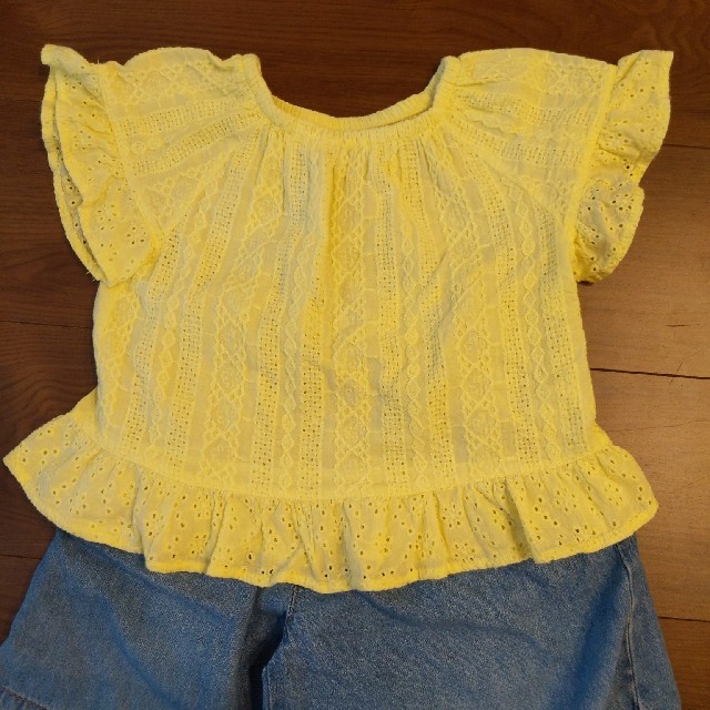 西松屋(ニシマツヤ)の黄色いトップス キッズ/ベビー/マタニティのキッズ服女の子用(90cm~)(Tシャツ/カットソー)の商品写真