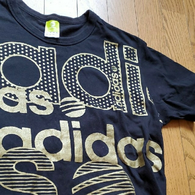 adidas(アディダス)の【値下げ】アディダスadidas黒にゴールドTシャツ レディースのトップス(Tシャツ(半袖/袖なし))の商品写真