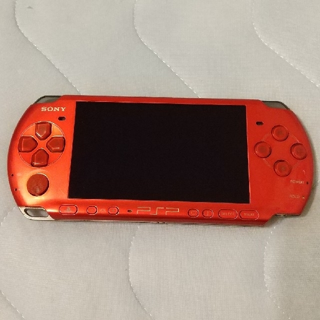 PlayStation Portable(プレイステーションポータブル)のPSP-3000 レッド エンタメ/ホビーのゲームソフト/ゲーム機本体(携帯用ゲーム機本体)の商品写真
