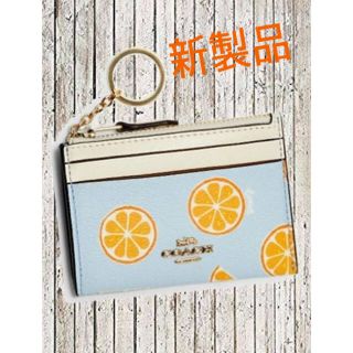 コーチ(COACH)の【COACH】新製品　オレンジ柄　定期／小銭入れ　キーリング付(パスケース/IDカードホルダー)