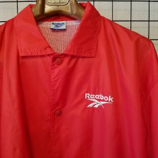 リーボック(Reebok)のReebok ワンポイント刺繍入り ナイロンコーチジャケット nylon JKT(ナイロンジャケット)