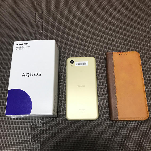 AQUOS(アクオス)のシャープ　SH-M08 アッシュイエロー　SIMフリー スマホ/家電/カメラのスマートフォン/携帯電話(スマートフォン本体)の商品写真