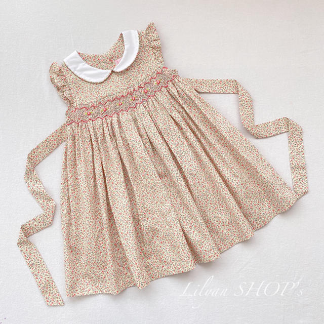 スモッキング ワンピース 半袖 フリル袖 ピンク 小花柄 リボン 100cm キッズ/ベビー/マタニティのキッズ服女の子用(90cm~)(ワンピース)の商品写真