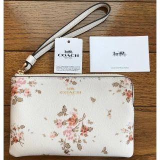 コーチ(COACH)のコーチ COACH ポーチ ハンドポーチ リストレット ホワイト花柄　人気　新作(ポーチ)