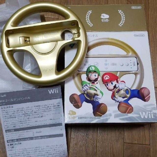 Wii(ウィー)のwii マリオカート ハンドル ゴールド エンタメ/ホビーのゲームソフト/ゲーム機本体(家庭用ゲームソフト)の商品写真