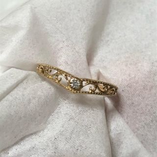 ジュエリーツツミ(JEWELRY TSUTSUMI)の【美品】 K10 ダイヤ 透かしリング Ｖ字 ツツミ(リング(指輪))