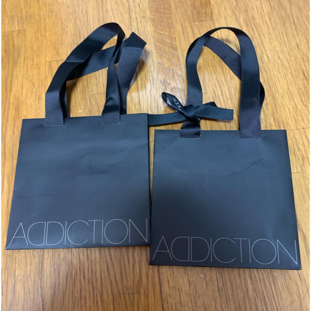 ADDICTION(アディクション)のADDICTION 紙袋 レディースのバッグ(ショップ袋)の商品写真