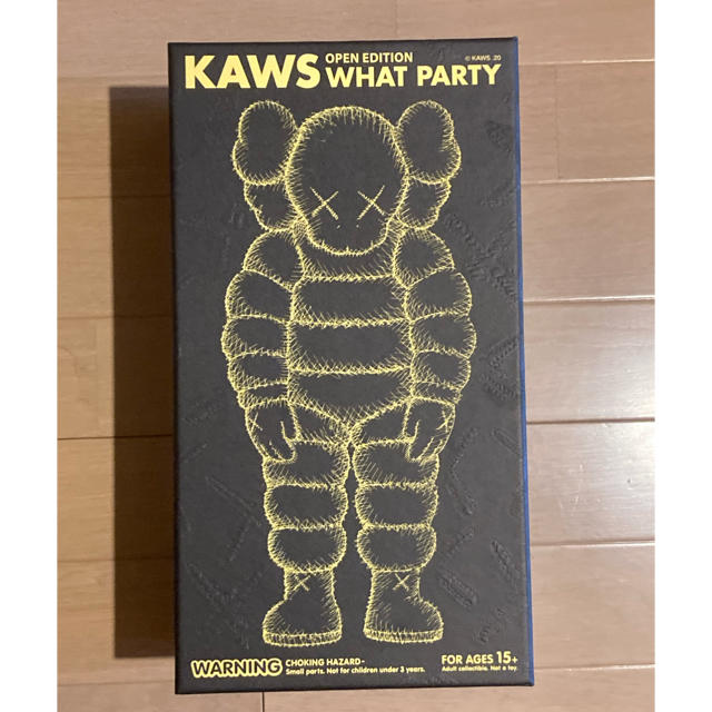 kaws what party figure yellow