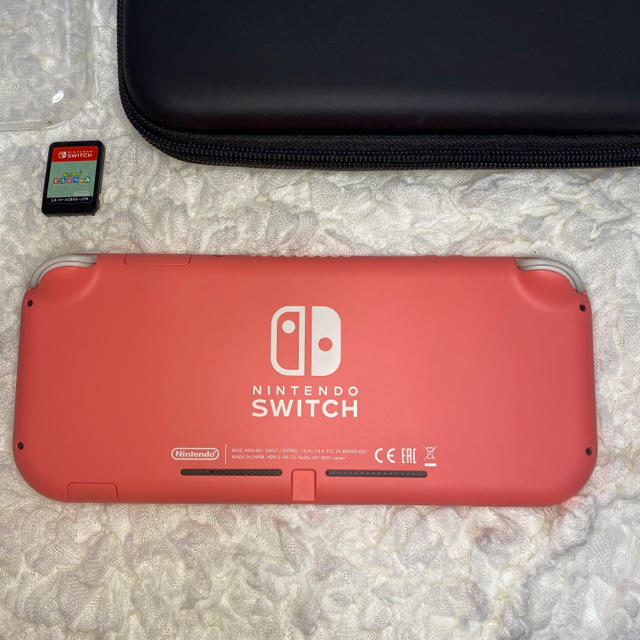 Nintendo Switch(ニンテンドースイッチ)のswitch lite コーラルピンク & あつ森セット エンタメ/ホビーのゲームソフト/ゲーム機本体(家庭用ゲーム機本体)の商品写真