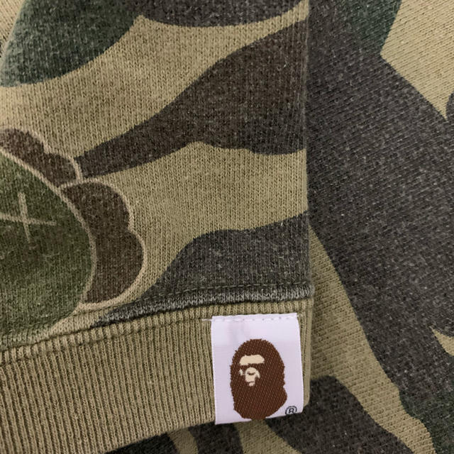 A BATHING APE(アベイシングエイプ)の激レアSサイズ！ BAPE×KAWSファーストカモ半袖スウェット緑 メンズのトップス(スウェット)の商品写真