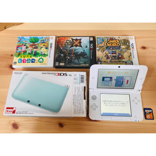 ニンテンドー3DS(ニンテンドー3DS)の[美品]Nintendo 3DS LLミント/ホワイト＋8GBメモリ＋ソフト3点 エンタメ/ホビーのゲームソフト/ゲーム機本体(携帯用ゲーム機本体)の商品写真