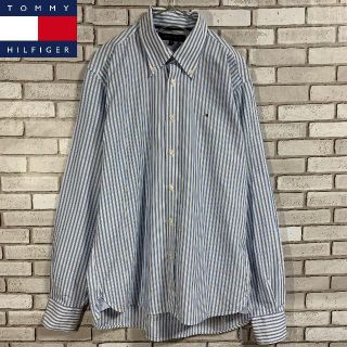 トミーヒルフィガー(TOMMY HILFIGER)のトミーヒルフィガー ライトブルー ストライプ長袖シャツ フラッグタグロゴ(シャツ)