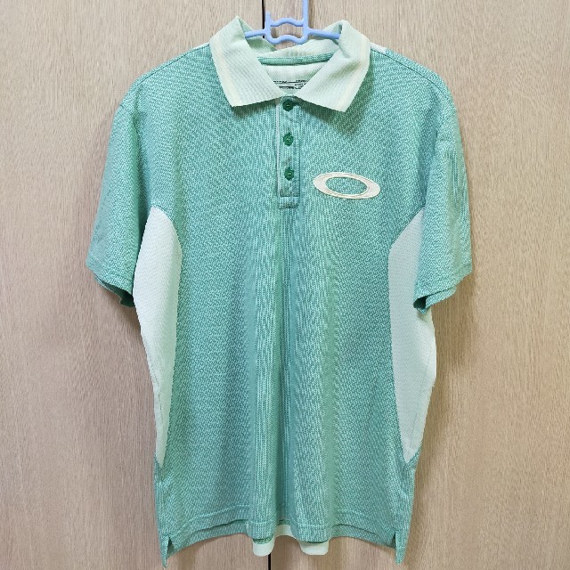 Oakley(オークリー)のOAKLEY ゴルフ用半袖シャツ スポーツ/アウトドアのゴルフ(ウエア)の商品写真