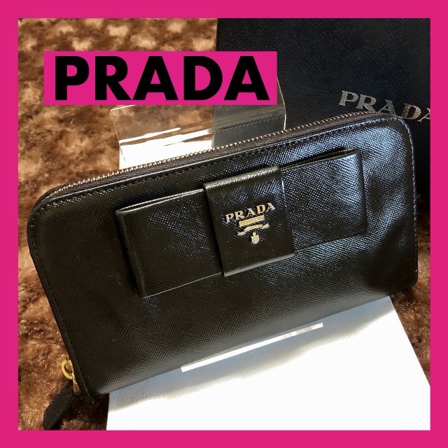 PRADA(プラダ)のぷちょお様専用　PRADA プラダ 長財布　リボン　ラウンドファスナー レディースのファッション小物(財布)の商品写真