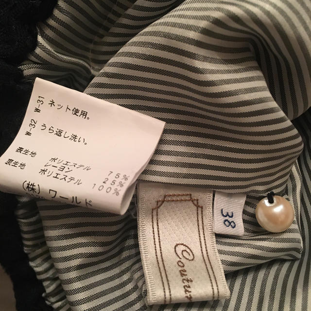 Couture Brooch(クチュールブローチ)のクチュールブローチ　ネイビー　リボン　パールボタン　 レディースのトップス(カットソー(長袖/七分))の商品写真