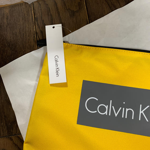 Calvin Klein(カルバンクライン)のカルバンクライン　ポーチ　セカンドバッグ　クラッチバッグ　ナイロン　イエロー メンズのバッグ(セカンドバッグ/クラッチバッグ)の商品写真