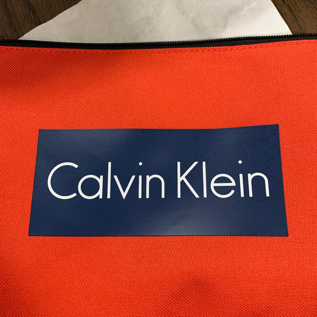 Calvin Klein(カルバンクライン)のカルバンクライン　新品　ポーチ　セカンドバッグ　ナイロン　オレンジ メンズのバッグ(セカンドバッグ/クラッチバッグ)の商品写真