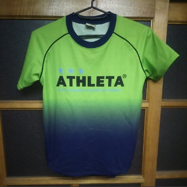 ATHLETA(アスレタ)の(中古品)アスレタ １４０cm サッカー シャツ  スポーツ/アウトドアのサッカー/フットサル(ウェア)の商品写真