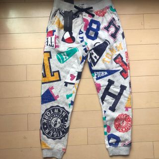 トミーヒルフィガー(TOMMY HILFIGER)の新品タグつき　トミーTommy 総ロゴスウェットパンツ(パンツ/スパッツ)