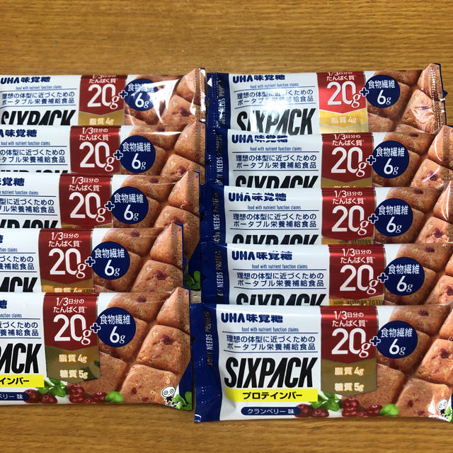 UHA味覚糖(ユーハミカクトウ)のUHA味覚糖　プロテインバー　SIXPACK クランベリー味 食品/飲料/酒の健康食品(プロテイン)の商品写真