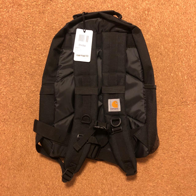 carhartt(カーハート)のカーハート Carhartt 橙色タグ リュック バックパック 黒色 メンズのバッグ(バッグパック/リュック)の商品写真